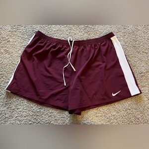 Nike Women's Burgundy Maroon Athletic Shorts with White Accents